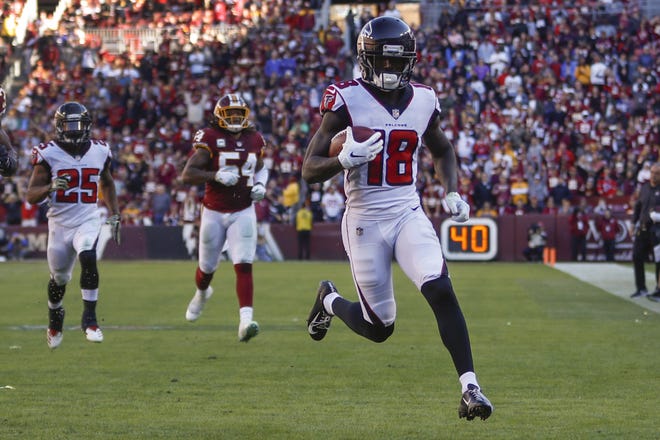 Atlanta Falcons wide receiver Calvin Ridley (18) carries the ball into the end zone for a touchdown during a Nov. 4, 2018 game against the Washington Redskins in Landover, Md. [PABLO MARTINEZ MONSIVAIS/AP FILE PHOTO]