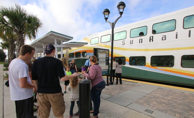 People pack the DeBary SunRail station waiting to catch the 10am south bound train Tuesday morning December 29, 2015. News-Journal/JIM TILLER