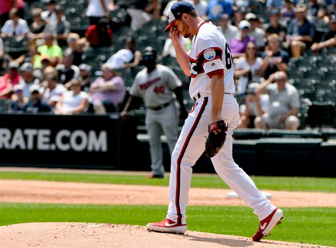 Chicago White Sox starting pitcher Dylan Covey (68) walks on the mound after Minnesota Twins Miguel Sano (22) hit a three run home run during the first inning of a baseball game Sunday July 28, 2019, in Chicago. (AP Photo/Matt Marton)