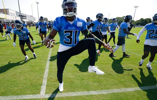 Titans free safety Kevin Byard (31) warms up during an NFL football practice at Saint Thomas Sports Park Saturday, July 27, 2019, in Nashville, Tenn. (George Walker IV/The Tennessean via AP)