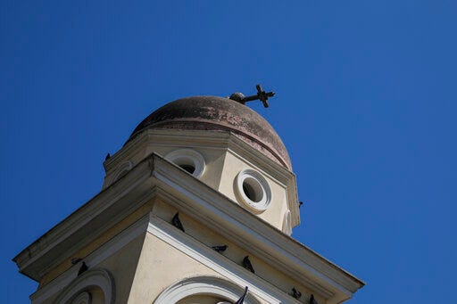 The bell tower of Pantanassa church at the Monastiraki square is damaged following an earthquake in Athens, Friday, July 19, 2019. The Athens Institute of Geodynamics gave the earthquake a preliminary magnitude of 5.1 but the U.S. Geological Survey gave it a preliminary magnitude of 5.3. The Athens Institute says the quake struck at 2:38 p.m. local time (1113 GMT) about 26 kilometers (13.7 miles) north of Athens. (AP Photo/Petros Giannakouris)
