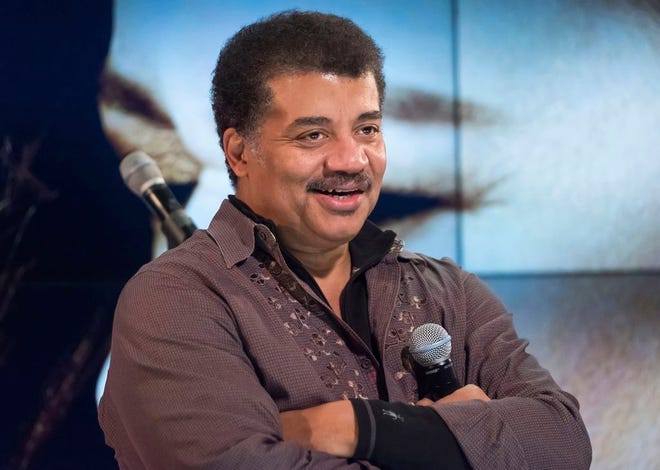 In this Nov. 1, 2017 file photo, Neil deGrasse Tyson attends a fan event celebrating the release Kelly Clarkson's album "Meaning of Life" at YouTube Space New York in New York. A museum spokesman said in a statement Thursday, July 25, 2019, the astrophysicist will keep his job as head of the Hayden Planetarium at New York's American Museum after the museum concluded its investigation into sexual misconduct charges against him.