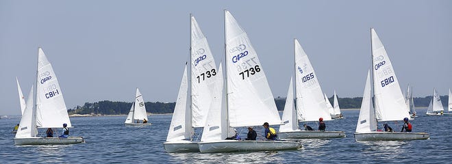 420 class boats cross the start line on a down wind leg.

The annual Lipton Cup Regatta on Quincy Bay hosted by Squantum Yacht Club on Sunday, July 28, 2019 Greg Derr/The Patriot Ledger