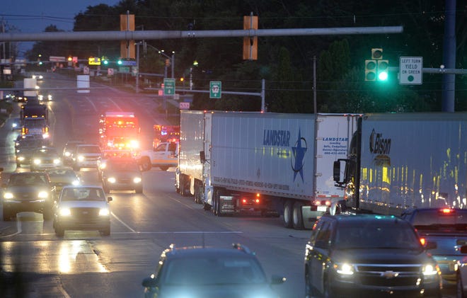 Traffic passes the scene of a female pedestrian fatally struck just south of the intersection of Route 97 and Interstate 90 in Summit Township on Tuesday. [GREG WOHLFORD/ERIE TIMES-NEWS]