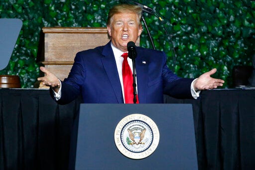 President Donald Trump gestures as he addresses a commemorative meeting of the Virginia General Assembly at Jamestown Settlement on the 400th anniversary of the meeting of the original House of Burgess in Jamestown, Va., Tuesday, July 30, 2019. (AP Photo/Steve Helber)
