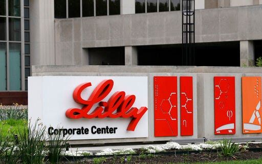 FILE - This April 26, 2017, file photo shows the Eli Lilly & Co. corporate headquarters in Indianapolis. Eli Lilly raised its 2019 forecast after a jump in sales from the diabetes treatment Trulicity helped push the drugmaker to a better-than-expected second quarter. (AP Photo/Darron Cummings, File)