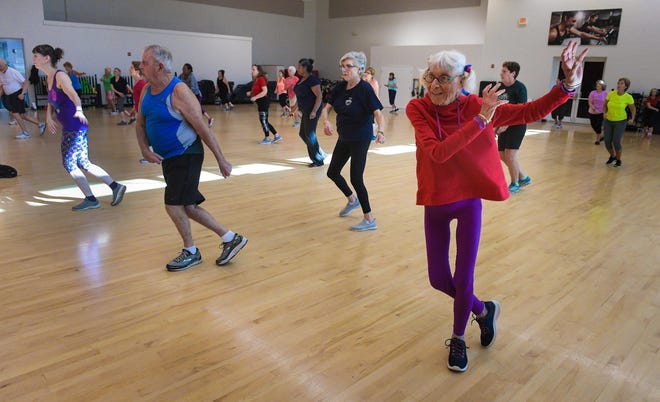 Dodie Zehnwirth enjoys a Prime Time cardio class at the Frank Berlin branch of the Sarasota YMCA. Seniors are the group most likely to be hurt by the recently announced closures of the Y's two remaining fitness facilities. [Herald Tribune Staff Photo/DAN WAGNER]