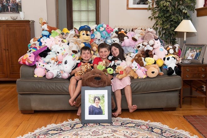 Laura Oswald and her children, pictured, Campbell, 9, Graham, 7 and Lincoln, 4, recently launched "Pajamas for Trauma" to collect items to comfort children and adults after traumatic experiences. The fundraiser is honoring their grandmother, Doylestown native Jeanette Campbell, who died in a Plumstead crash last year. Campbell loved to sew pajamas for others. [CONTRIBUTED]