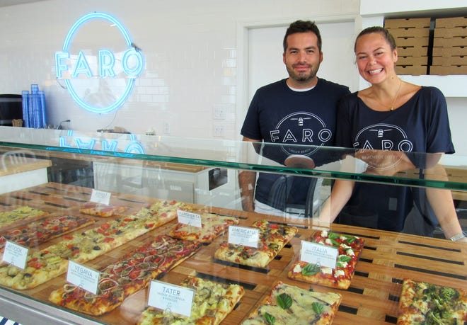 Alexia Tarantino and Dario Carbone, co-owners of Focaccia in Palm Coast, are now offering a new dining experience in Flagler Beach with Faro Beachside Eatery on north State Road A1A, just a short walk from the Flagler Beach Municipal Pier. [News-Tribune photos/Danielle Anderson]