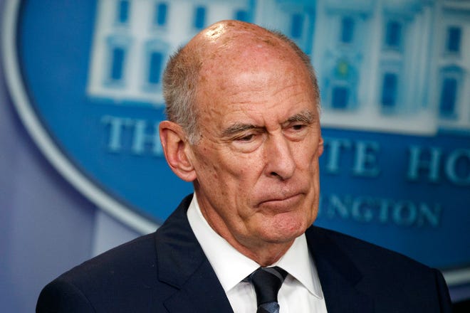 FILE - In this Aug. 2, 2018, file photo, Director of National Intelligence Dan Coats listens during a daily press briefing at the White House in Washington. Coats is to resign in days, after a two-year tenure marked by President Donald Trump's clashes with intelligence officials, U.S. officials said on Sunday, July 28, 2019. (AP Photo/Evan Vucci, FIle)