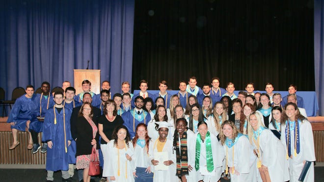 Students from the Class of 2019 and LEF board members gather for a photograph after the award ceremony. [SUBMITTED PHOTO]