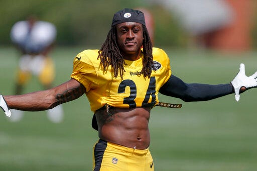 FILE - In this July 28, 2019, file photo, Pittsburgh Steelers strong safety Terrell Edmunds (34) posing for a photo with his jersey rolled up during an NFL football training camp practice in Latrobe, Pa. Edmunds is proud of his 2.1 percent body fat. Though, if he's being honest, he's hoping that number ticks up a bit in his second season, because it means the defense won't be on the field quite as much this fall. (AP Photo/Keith Srakocic, File)