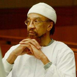 FILE- In this March 11, 2002 file photo, Jamil Abdullah Al-Amin watches during the sentencing portion of his trial in Atlanta. A federal appeals court has rejected an attempt by the 1960s black militant formerly known as H. Rap Brown to challenge his imprisonment for the killing of a sheriff's deputy. The 11th U.S. Circuit Court of Appeals ruled Wednesday, July 31, 2019 in the case of the man now known as Jamil Abdullah Al-Amin. He was convicted in 2002 of killing Fulton County sheriff's deputy Ricky Kinchen and wounding Kinchen’s partner, Deputy Aldranon English. (AP Photo/Ric Feld, File)