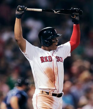 Boston Red Sox's Rafael Devers reacts after striking out with bases loaded, ending the eighth inning of the team's baseball game against the Tampa Bay Rays at Fenway Park in Boston, Tuesday, July 30, 2019. (AP Photo/Charles Krupa)