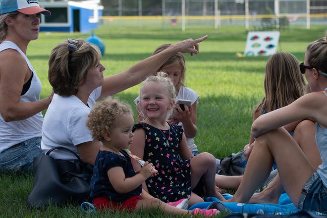A family picnics at last year’s Children's Finale. [Courtesy photo]