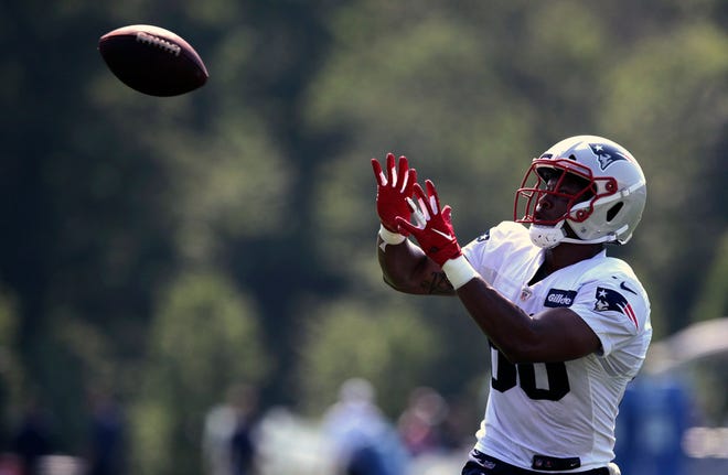 New England Patriots tight end Stephen Anderson tracks a pass during an NFL football training camp practice in Foxborough, Mass., Friday, July 26, 2019.