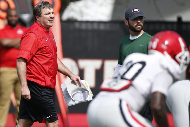 Georgia coach Kirby Smart at an NCAA football spring practice. Entering Smart's fourth season as head coach, the Bulldogs are ranked third in the Coaches Poll behind Clemson and Alabama, respectively. [Photo/Joshua L. Jones, Athens Banner-Herald]