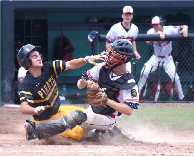 Hamburg Post catcher Spencer Kwilos, right, holds onto the ball after a collision with Rockland Post's Billy Sullivan at home plate Wednesday at the New York State American Legion Tournament at Murnane Field. Sullivan was called out to end Game 1 of the championship round 1-0.     

[Jon Rathbun / Times Telegram]
