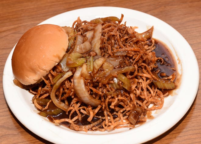 A hot chow mein sandwich from Mee Sum Restaurant is ready for eating. [Herald News Photo | Dave Souza]