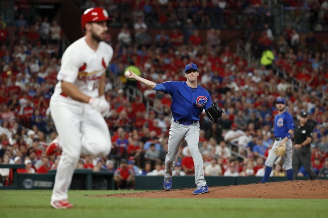 Chicago Cubs starting pitcher Kyle Hendricks did more than just throw strikes. He threw out St. Louis’ Paul DeJong at first during the fourth inning Wednesday in St. Louis. Hendricks also had seven strikeouts in seven innings and the Cubs beat the Cardinals 2-0 to end July tied for first in the NL Central division with rival St. Louis. [Jeff Roberson/The Associated Press]