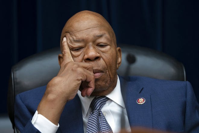 In this June 12, 2019 file photo, House Oversight and Reform Committee Chairman Elijah Cummings, D-Md., pauses in his committee seat on Capitol Hill in Washington. President Donald Trump says there was nothing racist about his weekend tweets calling Congressman Elijah Cummings' Baltimore-area, majority-black district a "rodent-infested mess" where "no human being would want to live." Now Trump is trying to deflect the accusations of racism by labeling the prominent black congressman as racist himself and accusing Democrats of trying to "play the race card." [ J. SCOTT APPLEWHITE / AP ]