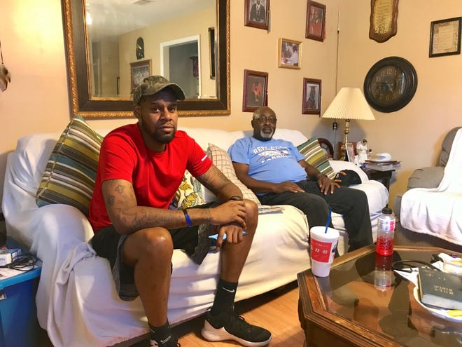 Curtis Brown (left) and Alfonzo Jenkins live near Jamestown Community Center, and they say its manager, Augusta Commissioner Sammie Sias, has been far from neighborly. Jenkins said Sias has used county resources to harass him. [SUSAN MCCORD/THE AUGUSTA CHRONICLE]