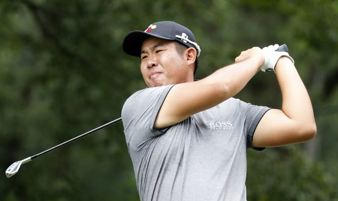 Byeong Hun An watches his tee shot on the fourth hole hole during the third round of the Wyndham Championship golf tournament at Sedgefield Country Club in Greensboro, N.C. Saturday. CHRIS SEWARD/THE ASSOCIATED PRESS