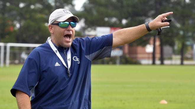 Georgia Southern head coach Chad Lunsford shouts directions at Eagle players during the Friday, Aug. 2 practice at Eagle Creek in Statesboro. [STEVE BISSON/SAVANNAHNOW.COM]