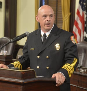 New Fire Chief Derik Minard addresses the crowd at City Hall after being sworn in as the 35th Chief of the Savannah Fire Department in June. [File photo Steve Bisson/savannahnow.com]