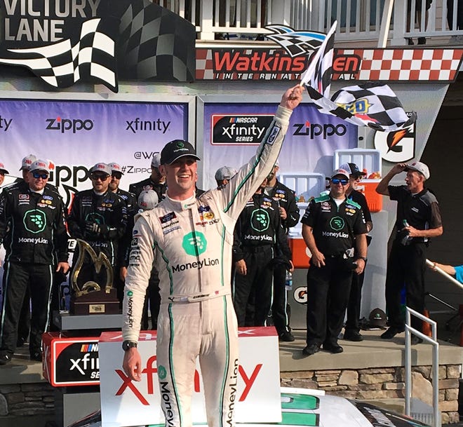 Austin Cindric, driver of the MoneyLion No. 22 Ford, celebrates his first-ever NASCAR Xfinity win at Watkins Glen International Saturday at the Zippo 200. [SHAWN VARGO/THE LEADER]