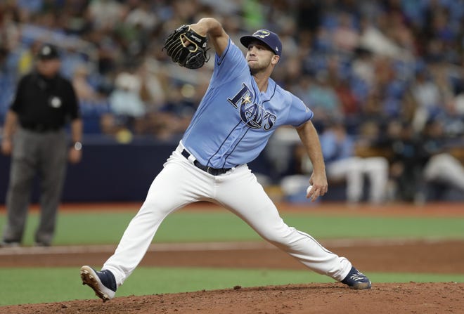 Tampa Bay Rays reliever Colin Poche pitches during the sixth inning Sunday against the Miami Marlins in St. Petersburg. [CHRIS O'MEARA/THE ASSOCIATED PRESS]