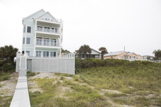 A home at 21809 Front Beach Road in Panama City Beach on Tuesday. The house is selling for $3,795,000. [JOSHUA BOUCHER/THE NEWS HERALD]