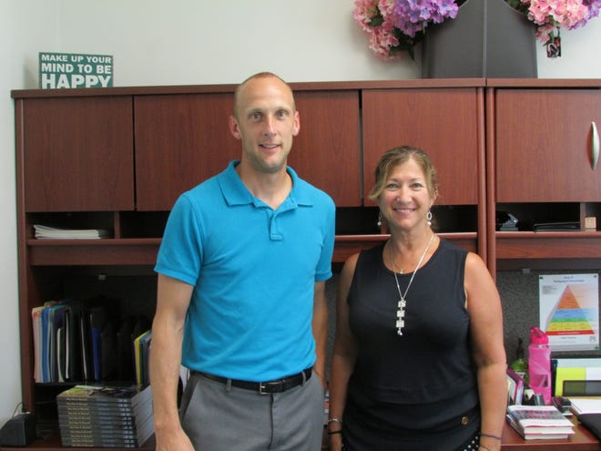 Grafton Middle School Assistant Principal Tim Fauth, left, with Principal Roseanne Kurposka in 2016. [File photo]