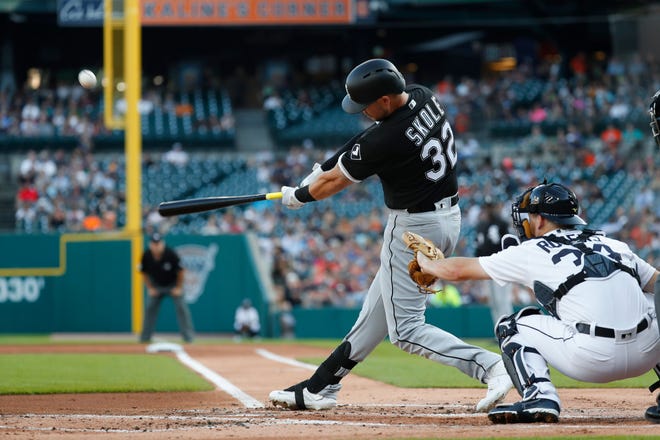 Chicago White Sox's Matt Skole hits a two-run double against the Detroit Tigers in the first inning Monday, Aug. 5, 2019, in Detroit. [PAUL SANCYA/THE ASSOCIATED PRESSS]