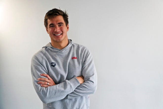 Nathan Adrian, a swimmer from the United States, poses for a photo during an interview at the swimming complex during the Pan American Games in Lima, Peru, Monday, Aug. 5, 2019. Adrian is competing at the Pan American Games just months after being diagnosed with testicular cancer. He has decided to continue training with the goal of competing at Tokyo 2020 Summer Olympics. (AP Photo/Fernando Llano)
