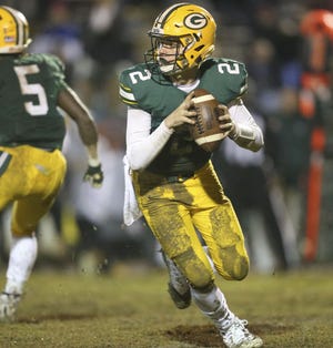 Gordo quarterback Tanner Bailey rolls out looking to pass against Wicksburg High at Gordo High School Friday, Nov. 9, 2018. [Staff file photo/Gary Cosby Jr.]