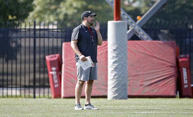 Ohio State coach Ryan Day watches the quarterbacks during practice at the Woody Hayes Athletic Center on Tuesday. [Kyle Robertson]