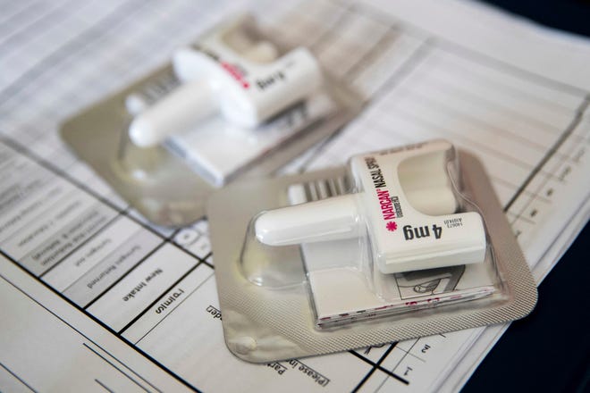 FILE - This July 3, 2018 file photo shows a Narcan nasal device which delivers naloxone in the Brooklyn borough of New York. On Tuesday, Aug. 6, 2019, health officials reported that prescriptions of the overdose-reversing drug naloxone are soaring, and experts say that could be a reason overdose deaths have stopped rising for the first time in nearly three decades. (AP Photo/Mary Altaffer)