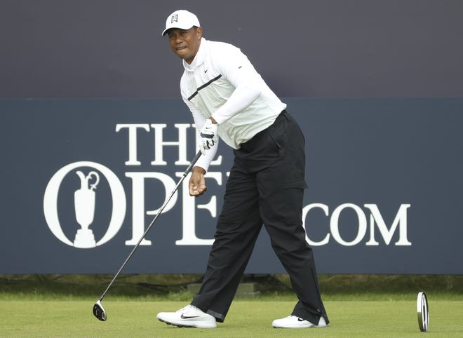 Tiger Woods of the United States watches his ball after playing the second round of the British Open at Royal Portrush last month. Woods is playing for the first time since then in this week's Northern Trust. [Peter Morrison/AP]