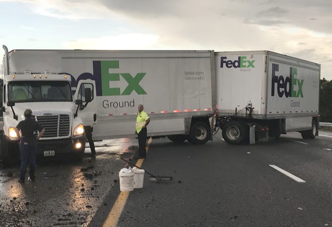 A FedEx truck blocked all three northbound lanes of Interstate 75 in Ocala after an accident Wednesday morning. [Austin L. Miller/Star-Banner]