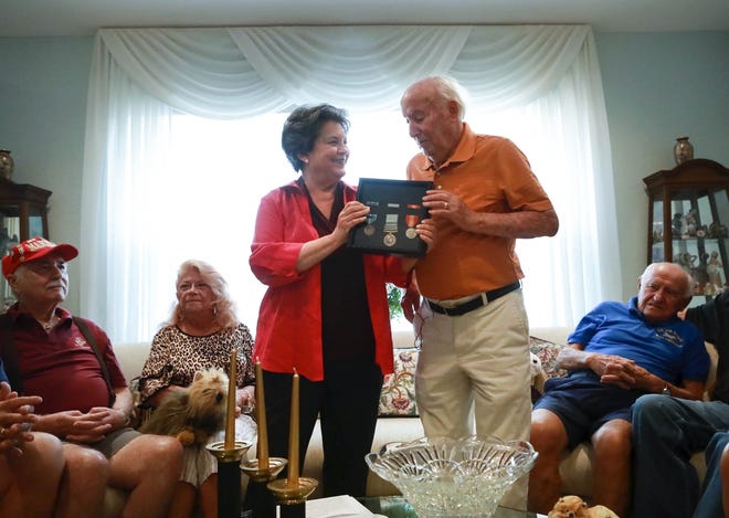 Congresswoman Lois Frankel presented veteran Gerald Camen with three medals for his service Wednesday, August 7, 2019 in Boynton Beach. Camen received the National Defense Medal, the Korean Service Medal and Bronze Star and the United Nations Service Medal. [BRUCE R. BENNETT/palmbeachpost.com]