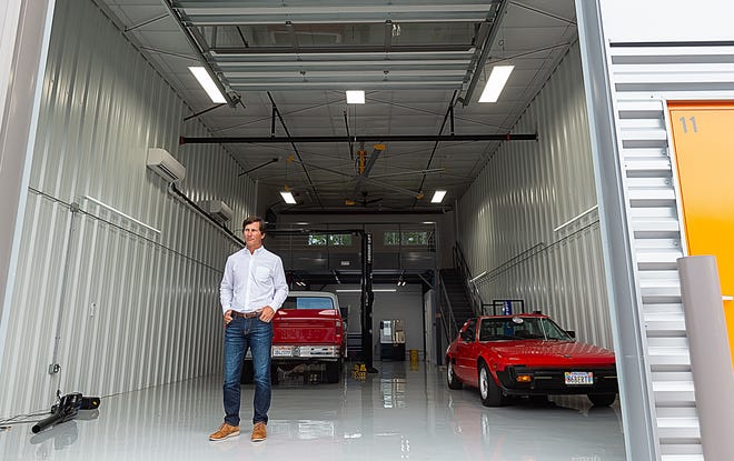 Wheelhouse Storage developer Chris Pilinko stands in a car condo at his facility in Ponte Vedra Beach on Wednesday. [PETER WILLOTT/THE RECORD]