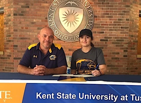 Signing a Letter of Intent is Starr Pope, seated next to Chuck Peach, Kent State Tuscarawas Head Softball Coach.

Submitted photo
