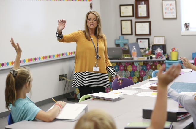 The new Sipsey Valley Middle School opened for the first day of class Wednesday, Aug. 7, 2019. Teacher Tammy Plowman gives instructions to her class, helping them learn where everything is in the new school building. [Staff Photo/Gary Cosby Jr.]