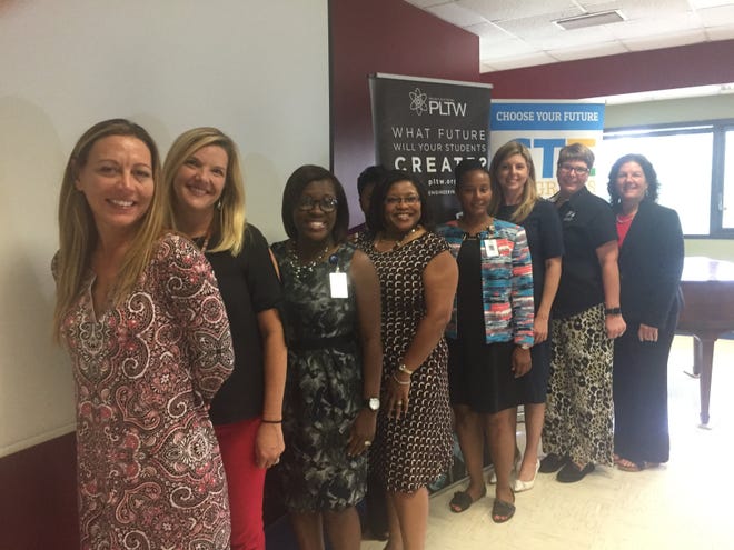 Grant recipients from left, Megan Mckinney (Terry Parker principal); Suzanne Shall (Kernan Middle); Aurelia Williams (Twin Lakes Middle); Sadie Milliner-Smith (J.E.B. Stuart Middle); Kenyannya Wilcox (Highlands Middle Principal); Emily Kristansen (Oceanway Middle); Jennifer Bridwell (Lake Shore Middle); Tamara Tuschhoff (Joseph Stilwell Middle). [Photo provided by Duval Schools]
