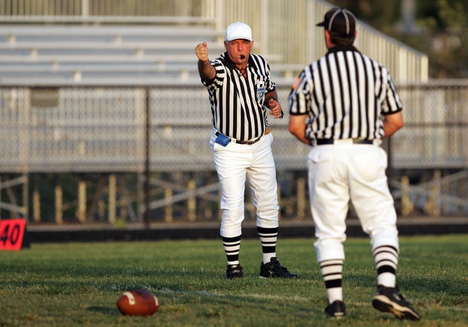 With the start of the high school football season less than two weeks away, football officials are threatening to go on strike. [POST FILE]