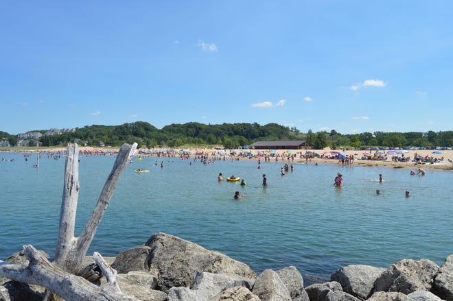 Samples taken by the Ottawa County Department of Public Health on Thursday, Aug. 8, showed a surge in E. coli levels in Lake Michigan at Holland State Park. [Sentinel file]