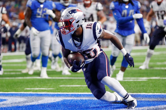 Patriots receiver Jakobi Meyers pulls in a 5-yard pass for a touchdown during the first half Thursday night against the Detroit Lions at Ford Field. [The Associated Press]