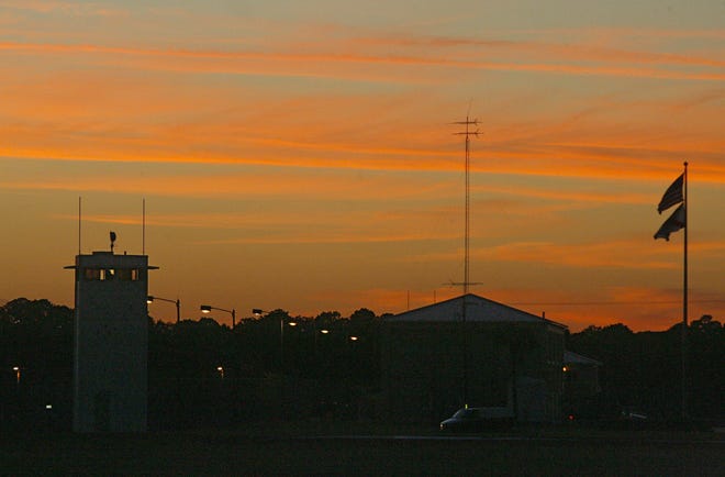 The Florida State Prison is seen at sunset in Raiford on Oct. 23, 2012, after the 11th U.S. Circuit Court blocked the scheduled execution of 64-year-old John Errol Ferguson. He had been convicted 34 years ago of eight slayings that jolted South Florida in the 1970s. Florida officials immediately asked the U.S. Supreme Court to lift the stay. [Phil Sears/News Herald file photo]