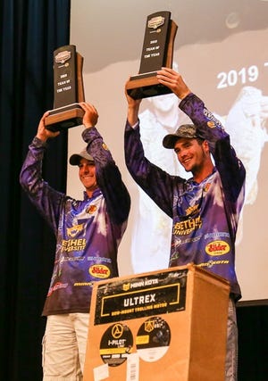 Dax Ewart, Left, and K.J. Queen show off their Bassmaster College Team of the Year trophies. [Photos provided by BASS]